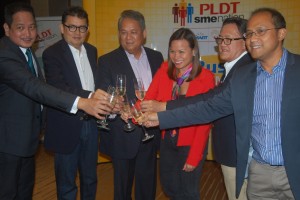 PLDT Executive Vice President and ePLDT President and CEO Eric Alberto,andf irst Vice President and head ofeSME Business Kat Luna-Abelarde with they are partnership Philippine Retailers Association,Go Negosyo,PNB and Google