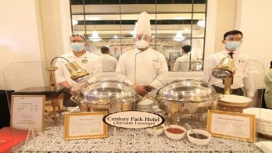 Executive-Sous-Chef-Huey-Marcial-center-stands-proud-at-the-Century-Park-Hotel-booth-during-the-Media-Grand-Launch-at-the-Manila-Hotel
