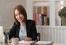 Portrait of Confident Asian business woman in her office