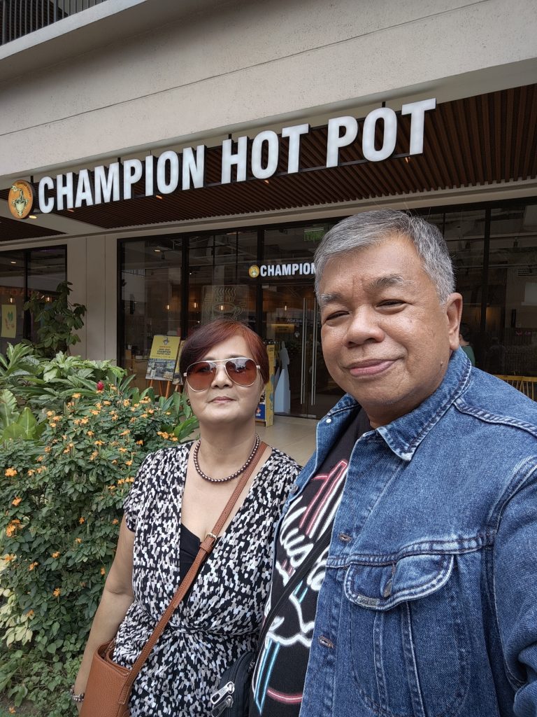 Selfie at Champion Hot Pot Facade