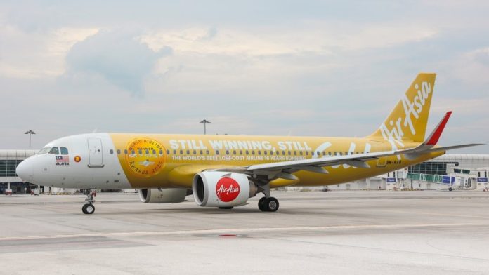 AirAsia Philippines Paints MOA Globe Red and Gold to Celebrate 16th Skytrax Win_3 AirAsia Philippines Paints MOA Globe Red and Gold to Celebrate 16th Skytrax Win_3