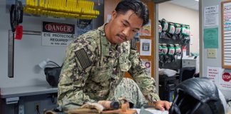 Filipino Sailor Inspects U.S. Navy Aircrew Equipment 250716-N-JD579-2064