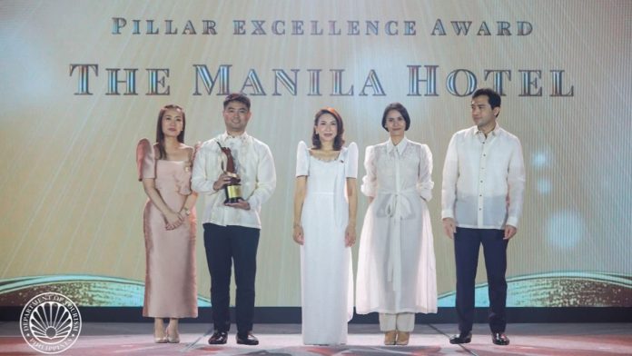 The Manila Hotel's assistant director of sales Adrian Salumbides, marketing manager Abby Legaspi Maguigad with TPB COO Margarita Nograles, DOT Secretary Christina Garcia Frasco, and DOT Usec Shahlimar