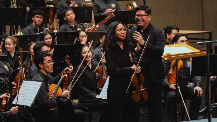 01. CCP Scholar Kaya Mendoza performs with the Orchestra of the Filipino Youth in its New Worlds, New Horizons concert last August 2025.