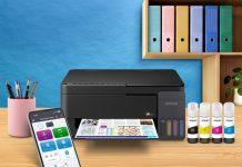 Meet the New Epson EcoTank Series: The Next Generation of Affordable Printing Modern workplace with tablet computer near color wall